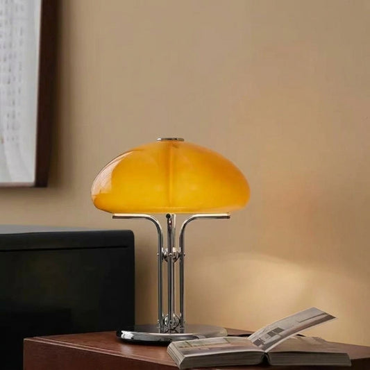 Mushroom table lamp on a bedside table in a modern bedroom